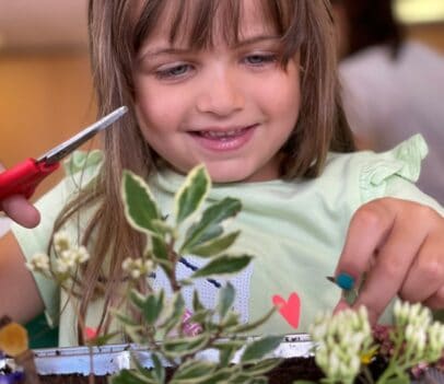 Children learn how to make their own min garden