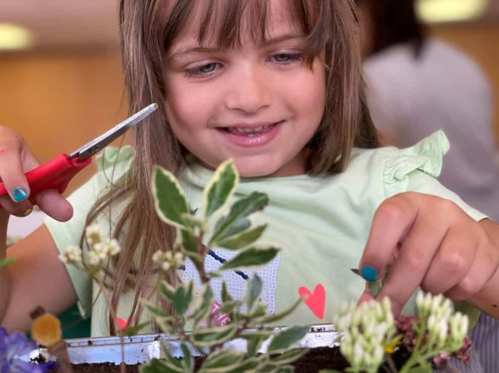 Children learn how to make their own min garden