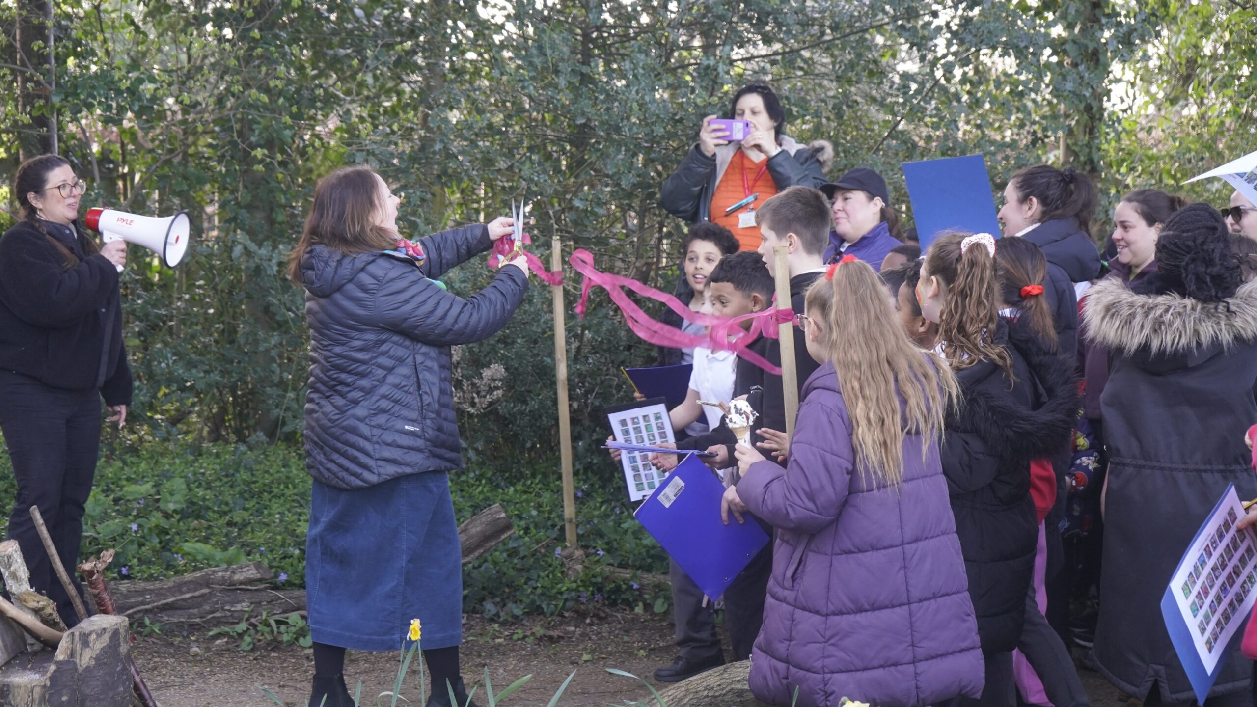Mrs M Enchill-Balogun, Headteacher at Capel Manor Primary School opens the new Fairy Forest for very excited children to explore.